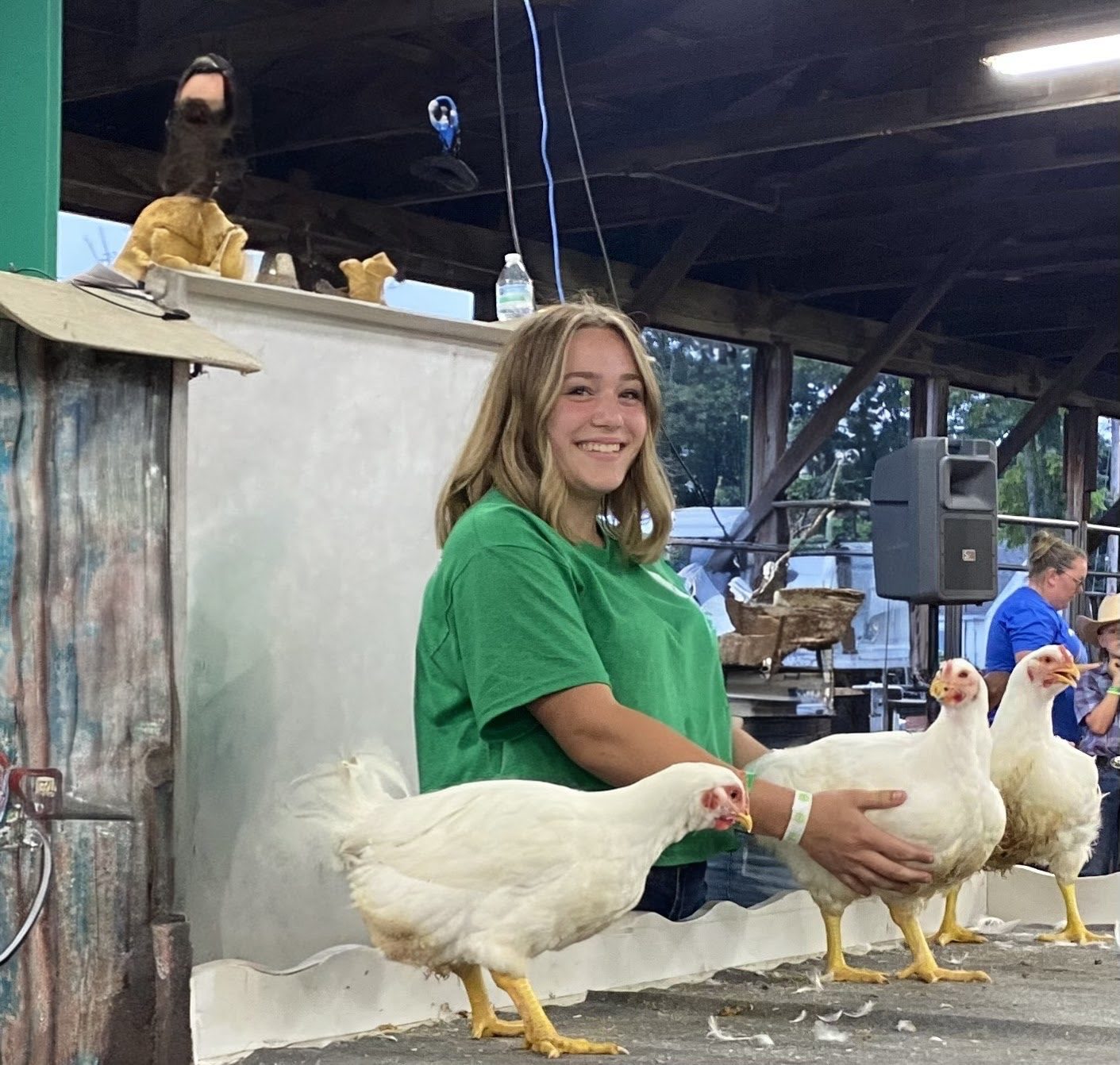 Emelia showing birds at the 4-H fair
